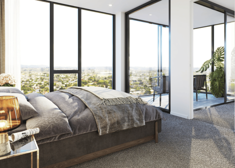 Plus Pacific Towers bedroom with stunning west Auckland views